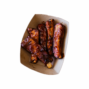 Barbecue ribs in a cardboard container.